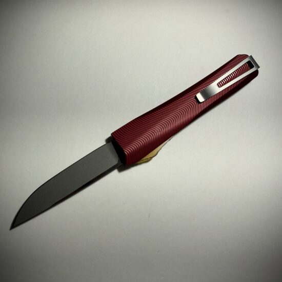 Alternative view of 0331 Pulsar Garnet/Ultem-Stainless S/E Magnacut
