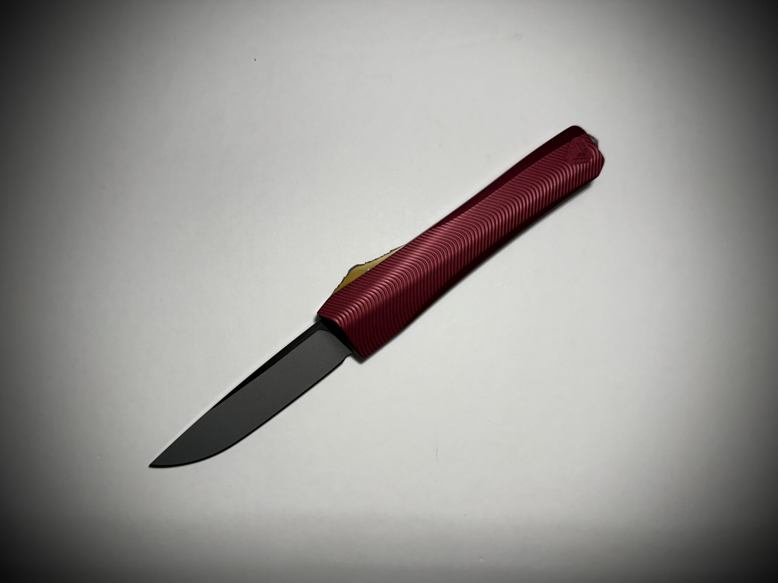0331 Pulsar Garnet/Ultem-Stainless S/E Magnacut